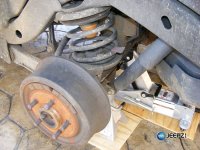 remove_wheel_jeep_wrangler_coil_suspension_lift.JPG