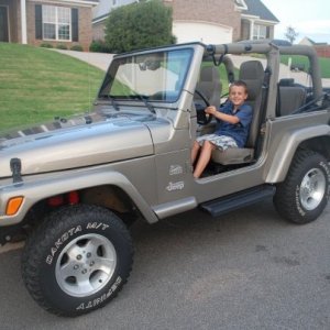 Silly kid...can't even reach the pedals.