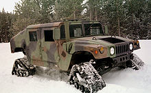 220pxHumvee_equipped_with_four_snow_trea-1.jpg